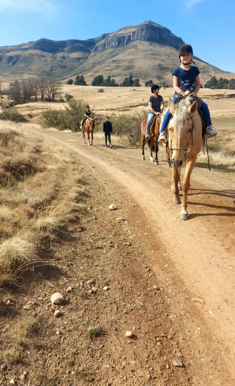 Young riders on a Steepside horse ride below the mountains near Rhodes